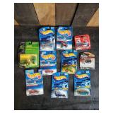 Lot of hotwheels and one john deere still in packages