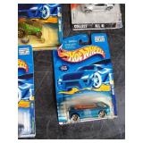 Lot of hotwheels and one john deere still in packages