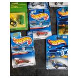 Lot of hotwheels and one john deere still in packages