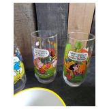 Lot of Disney and other drinking glasses of various styles
