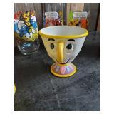 Lot of Disney and other drinking glasses of various styles