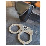 2 Safariland Leather gun Belts and Vintage Smith & Wesson Handcuffs