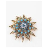 Gold Tone Blue Rhinestone Starburst Brooch