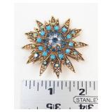 Gold Tone Blue Rhinestone Starburst Brooch