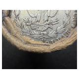 Unopened 20 coin roll of Morgan silver dollars with an 1893 at one end and a CC at the other end