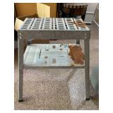 Metal Utility Equipment Stand Slotted Top Lower Shelf Rusted Base