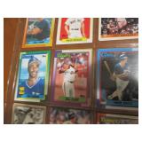 Double Sided page of sports cards featuring Wade Boggs, Roger Clemons, Will Clark, Mark Grace, Larry Johnson and more!!
