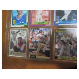 Double Sided page of sports cards featuring Wade Boggs, Roger Clemons, Will Clark, Mark Grace, Larry Johnson and more!!