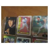 Double Sided Page of Sleeve of sports cards featuring Mark McGuire, Jose Canseco, Mark Grace, Bo Jackson, Roger Clemons and More Players