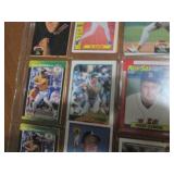 Double Sided Page of Sleeve of sports cards featuring Mark McGuire, Jose Canseco, Mark Grace, Bo Jackson, Roger Clemons and More Players