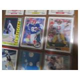 Double Sided Page of Mixed Lot Sports Cards in Plastic Pages