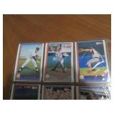 Double sided page of baseball cards including an assortment of years and players
