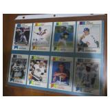 Uncut sheet of sports cards featuri...