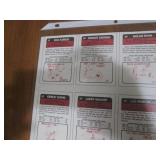 Uncut sheet of sports cards featuri...