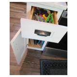Content of lower cupboard and drawe...