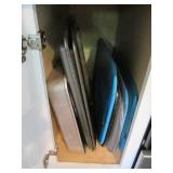 Content of lower cupboard and drawe...