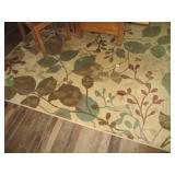 Neutral tone leaf print area rug ap...