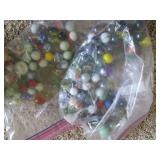 Lidded jar and bag of vintage marbl...