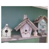 Collection of outdoor birdhouses, s...