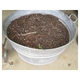 Metal lidded trash can and garden p...