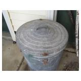 Metal lidded trash can and garden p...