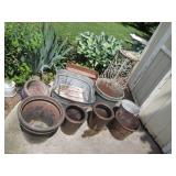 Mostly metal outdoor planters and b...