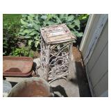 Mostly metal outdoor planters and b...