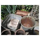 Mostly metal outdoor planters and b...