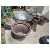 Mostly metal outdoor planters and b...
