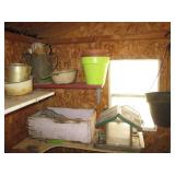 Metal pitchers and pans, hanging wo...