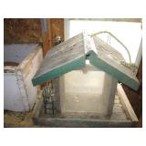 Metal pitchers and pans, hanging wo...