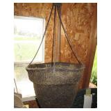 Metal pitchers and pans, hanging wo...