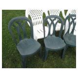 Outdoor patio chairs in green and w...