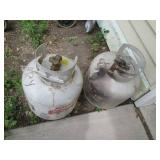(2) 20lb propane cylinders **One em...