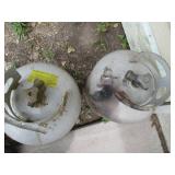 (2) 20lb propane cylinders **One em...