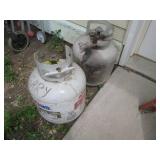 (2) 20lb propane cylinders **One em...