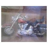 Woos Encased Harley Davidson Cycles...