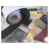 Large selection of sandpaper and pa...