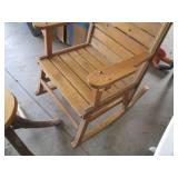 Slatted wood rocking chair and Tree...
