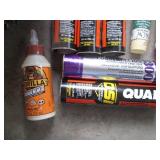 Box of various wood glues, filler, ...