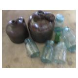 Stoneware crock jugs and blue tone ...