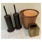 Group of bathroom essentials wicker waist basket toiler brush