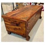 Cedar wood chest with brass corner hardware and ornate details