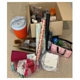 Various paper plates, plastic cups, party supplies