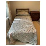Vintage French Provincial style twin bed, dark wood frame with a cushioned, light green floral upholstered headboard