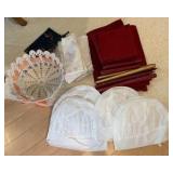 Group of placemats, napkins, candles, chef hats misc