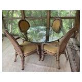 Outdoor Ratan patio set with glass tabletop, chairs