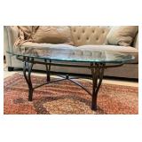 Wrought iron oval coffee table with beveled glass top
