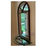 Ornate arched entryway mirror with matching wall console
