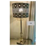 Opulent lamp with metal shade, amber crystals and polished chrome stand